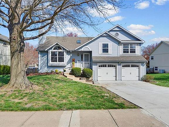 Lots of curb appeal and a modern two-car garage with remotes.