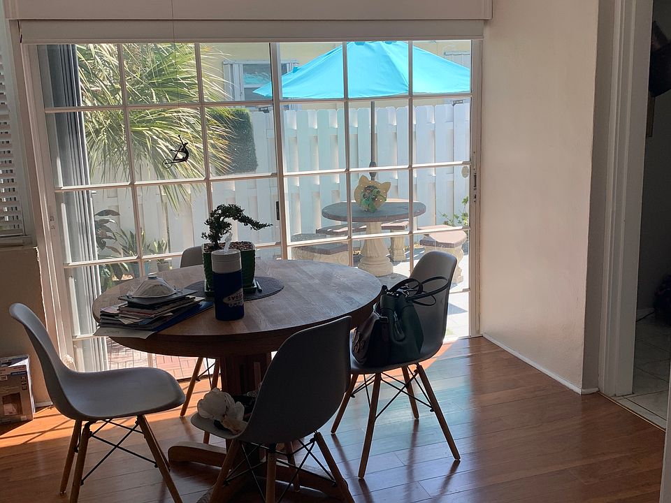 Spacious dining area with Sliders to private patio!