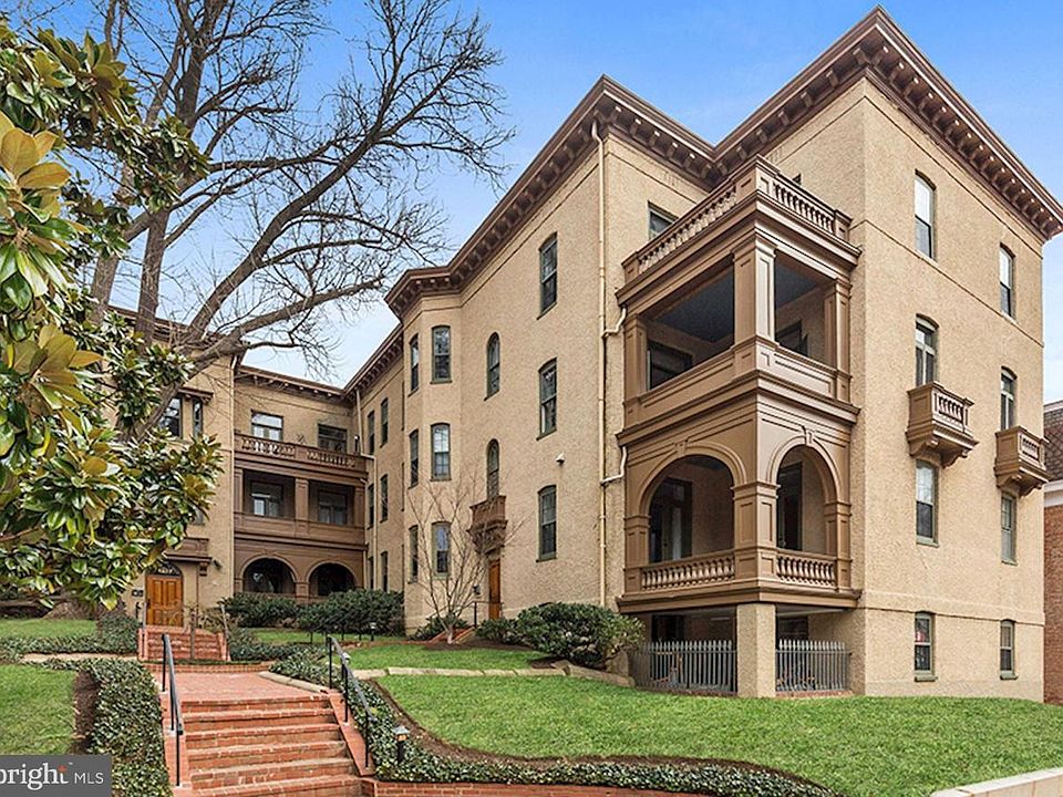Exterior View of corner unit with covered balcony on 2nd floor.