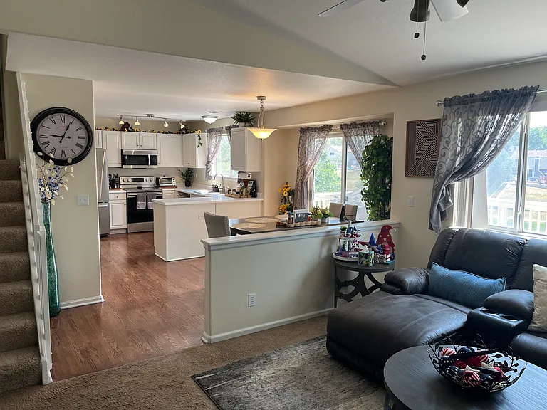 Kitchen and living room are right by the back deck for fun evening get-togethers