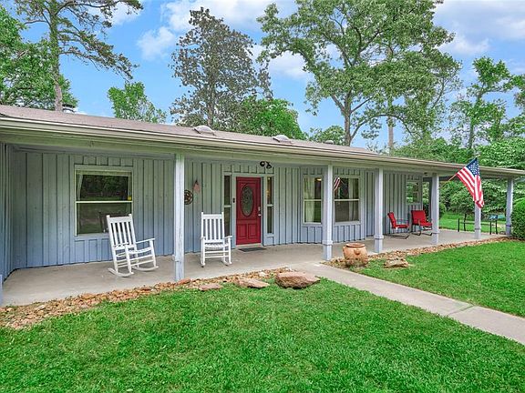 This porch is deep and wraps around to the side for extra space. Come gather out here with company, play a card game, enjoy a cool drink at the end of the day while you watch the sunset, star at the stars.