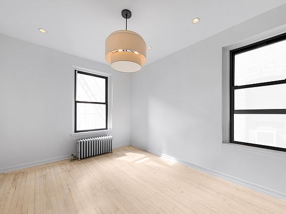 3rd image of 212 E 13th St APT 4D