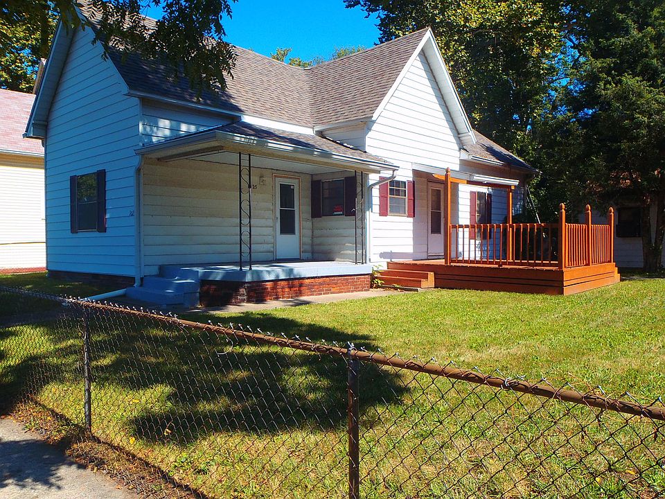 nice deck, fenced yard + detached garage 