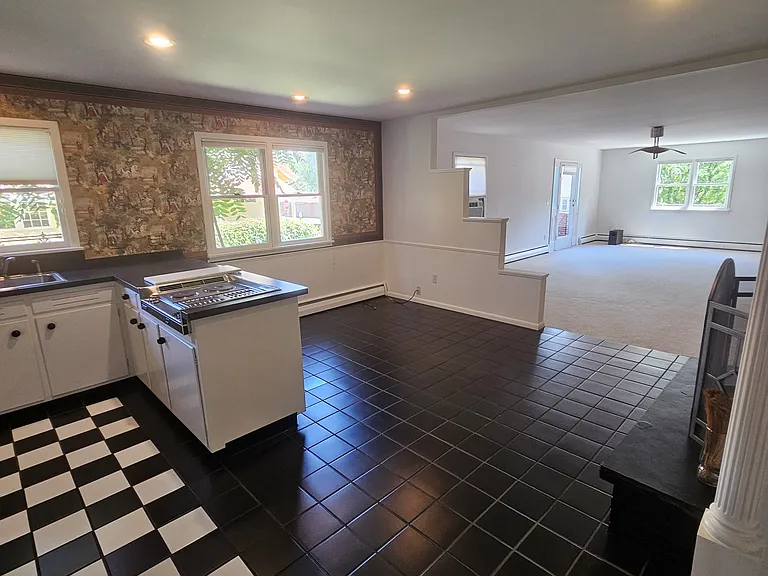 View into the Dining Room and Living Room from the Kitchen