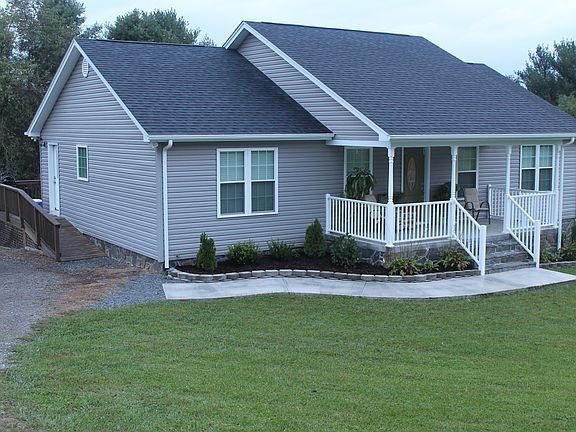 Left side with driveway