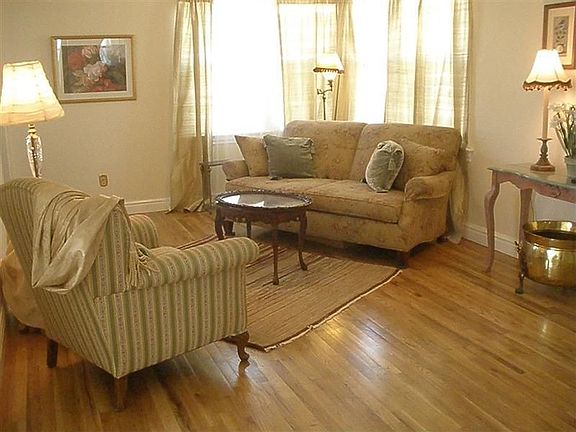 Living room w/ refinished hardwoods