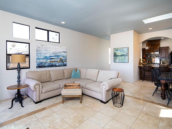 Family room and dining area - Furnished Rental with white water ocean and coastline views