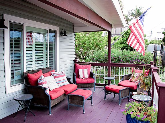 Wide front porch with lots of room for gathering and chatting with neighbors