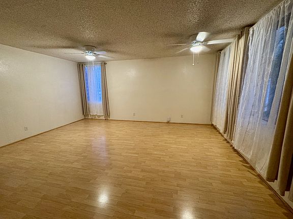 View from the kitchen area. Two ceiling fans were added to the room.