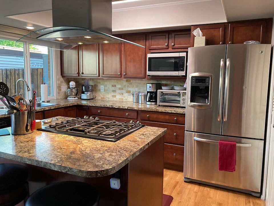 Lots of counter space, range hood and gas stove