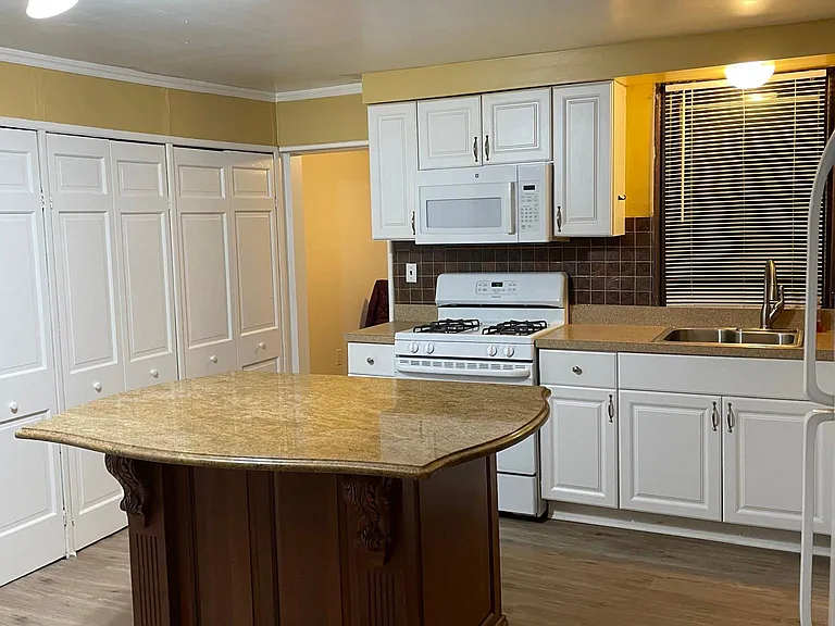 Literally a wall of pantries in the kitchen!