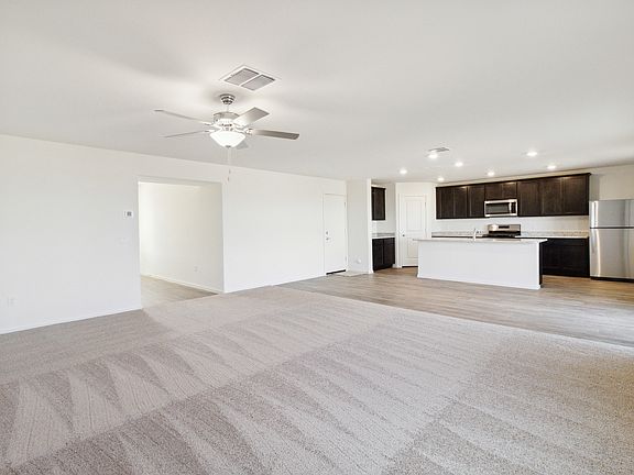 The kitchen overlooks the dining area and living room so you never miss a beat.
