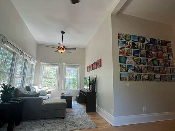 12 foot ceilings, classic ceiling fans, and tons of newer windows and natural light, hardwood floors throughout