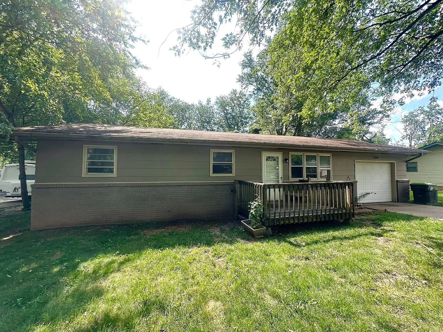 3 Bedroom Home with Garage and Spacious Fenced Yard! — Photo 3