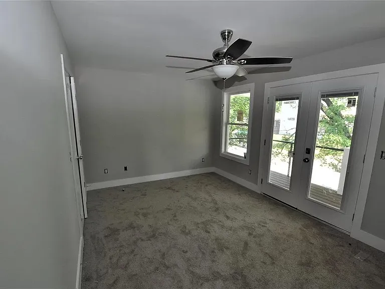 2nd bedroom with walk in closet and balcony access. No ensuite bath