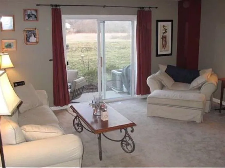 Living room with private patio