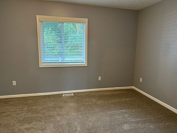 rear facing second bedroom - this one has a walk-in closet!