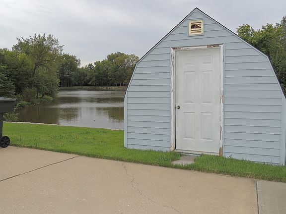 Storage shed by lake 