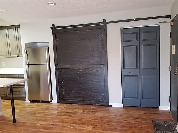Entry area with coat closets and pantry