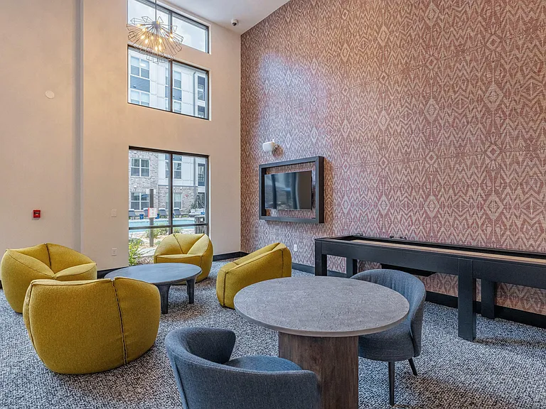 Clubhouse with TVs, Shuffleboard and Air Hockey