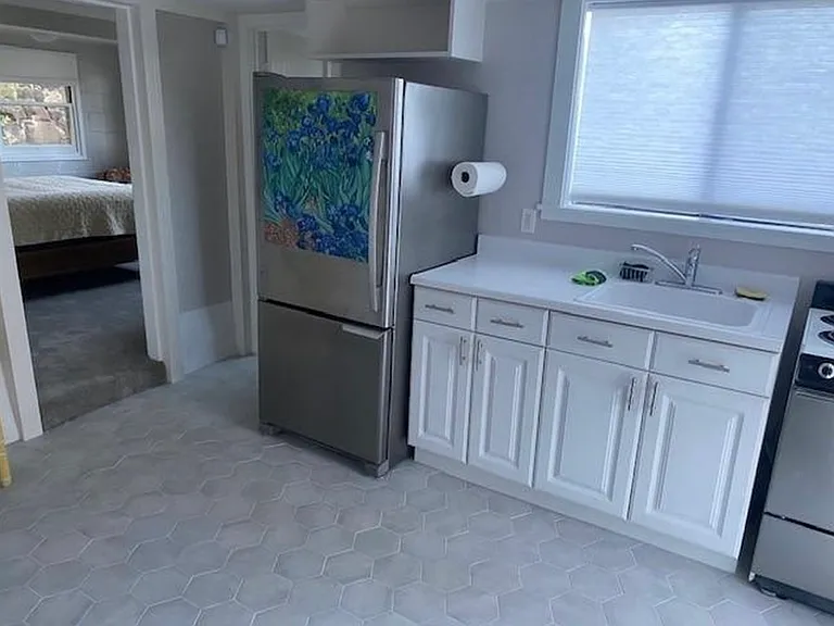 downstairs kitchen area to bedroom
