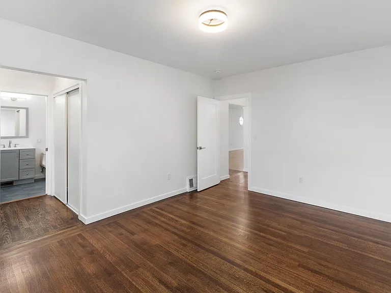 Master bedroom with walk-in closet and bathroom