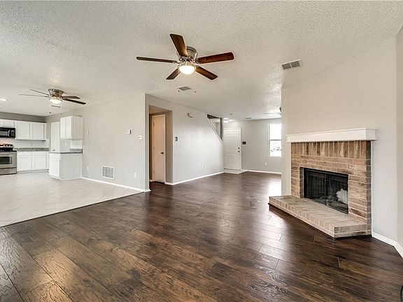 Great open concept in this home with open living and family room that looks into the breakfast and kitchen area.