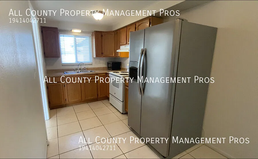 Wonderful 2 Bed 1 Bath with a Big Backyard (partially fenced), a Carport with Storage Closet, Lau... — Photo 2