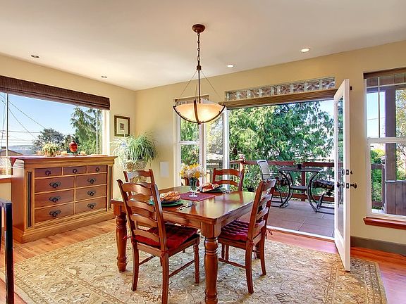 Open the French doors to let the fresh air in! Large dining room bathed in natural light. Let the outdoors in! Glass blocks and well placed vegetation maximize the privacy here, but doesn't block the views. Truly breathtaking.