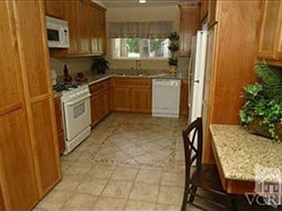 Kitchen. Now has Stainless Steel Dishwasher added since phot