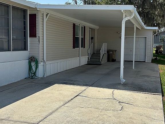 Double carport with shed