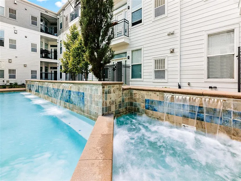 Refreshing pool with tranquil water features