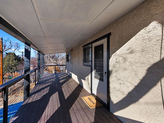 Large deck. Go ahead! But some chairs and a table down, set up your easel to paint the mountains, whatever you like!