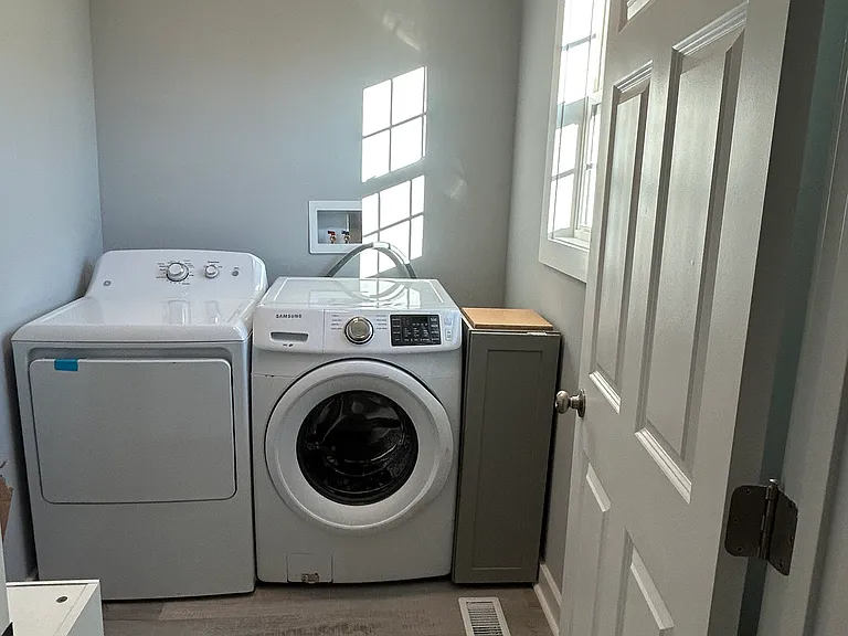 Large Laundry Room with Washer & Dryer