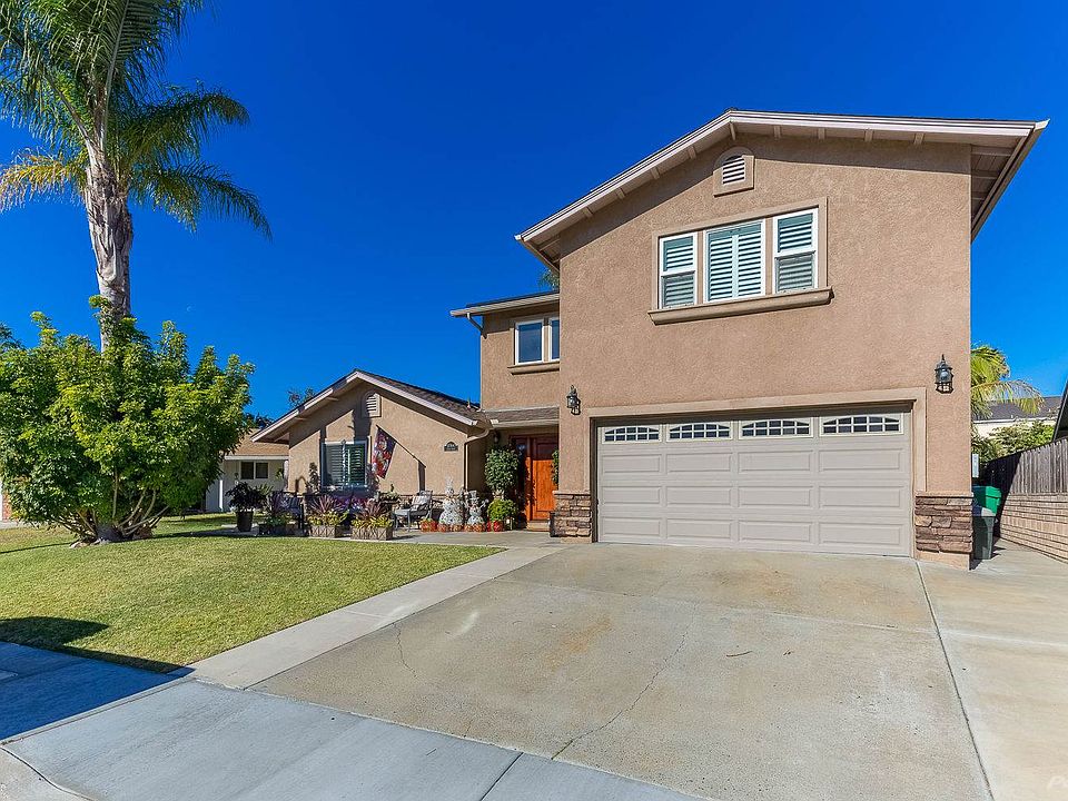 This renovated home offers a newer stucco exterior, newer Milgard windows, insulated garage door, stacked stone exterior wainescotting & much more!