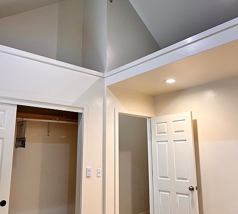 Bedroom with loft storage
