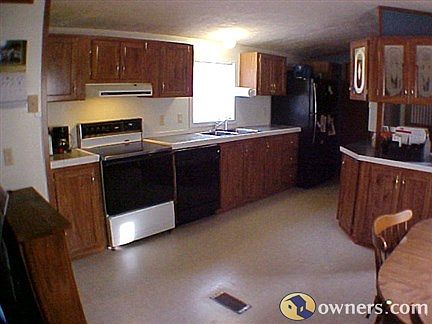 Kitchen - dishwasher, range, 2-sinks, fridge