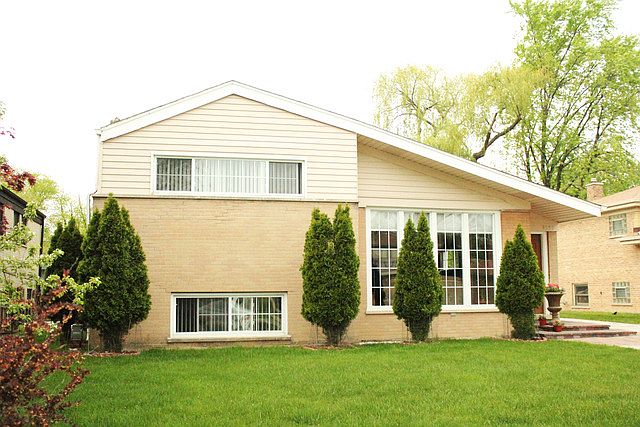 1st image of 9532 N Tripp Ave