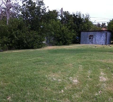 BACK YARD WITH UTILITY SHED