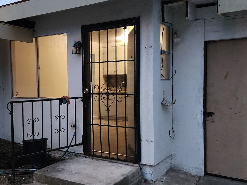 Entry door with metal screen for fresh air.
