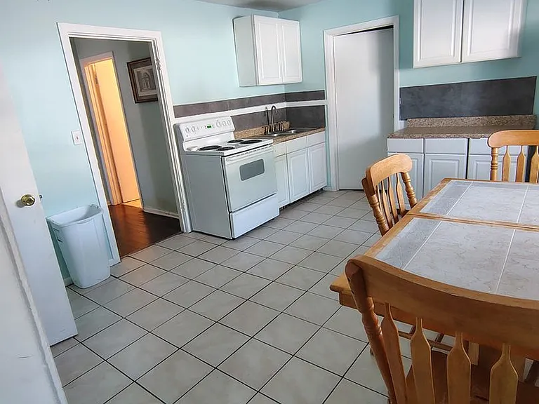 2703 Tremper Ave — Photo 7