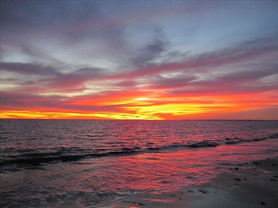 Sunset from beach condo is on