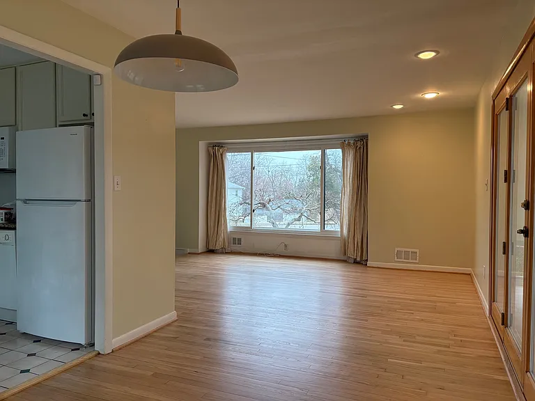 Looking from dining room to kitchen and living area.