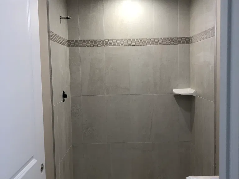 Walk in shower bathroom.