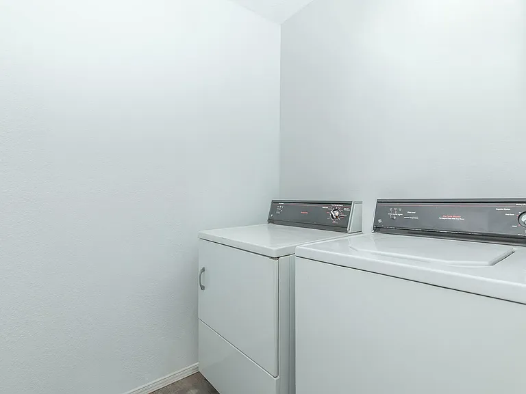 Convenient Washer and Dryer Connections at Wind Tree Apartments in El Paso, TX
