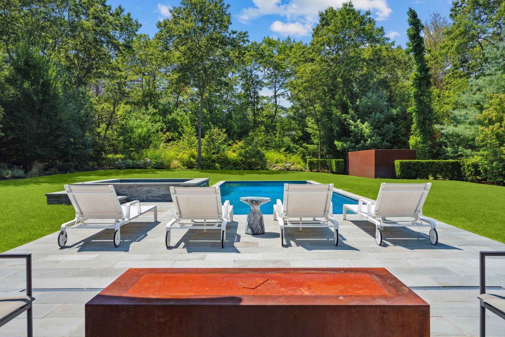  fire pit seating area overlooking pool area
