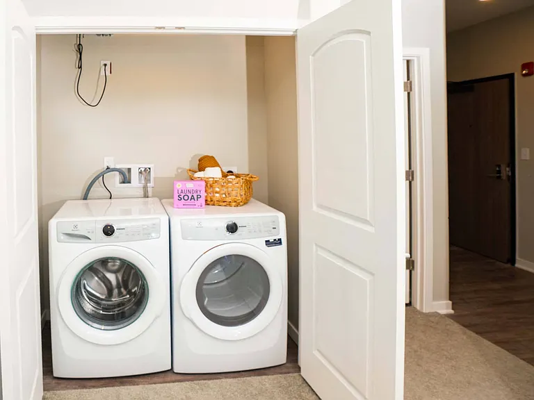 In-unit washer and dryer located in a closet at Heartland Flats North Platte.