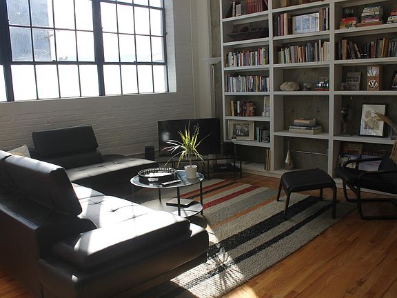Large living room with custom bookshelf
