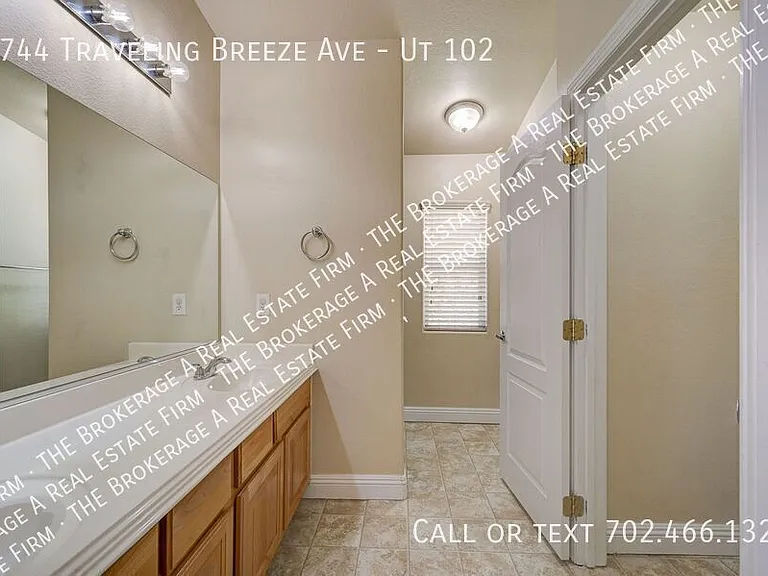 8744 Traveling Breeze Ave #102 — Photo 25