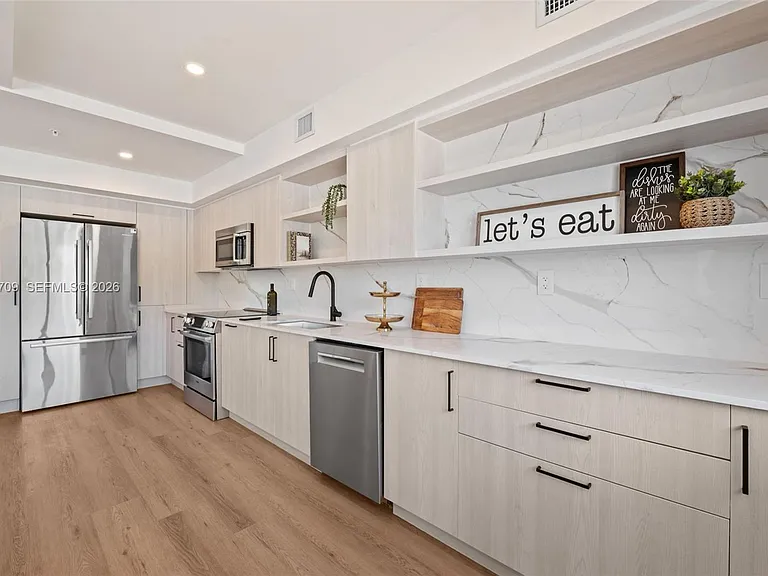 728 NW 55th Ter #728 — Photo 8